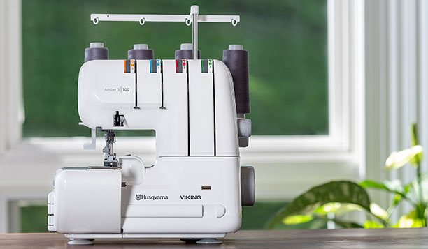 Husqvarna Viking Husqvarna AMBER™ S | 100 Overlock Sewing Machine + Free bundle worth £35.00