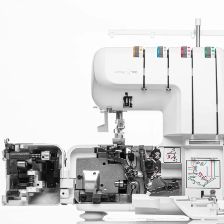 Close-up of the Amber S100 color-coded threading paths for easy setup and front of machine fully open for easy access.
