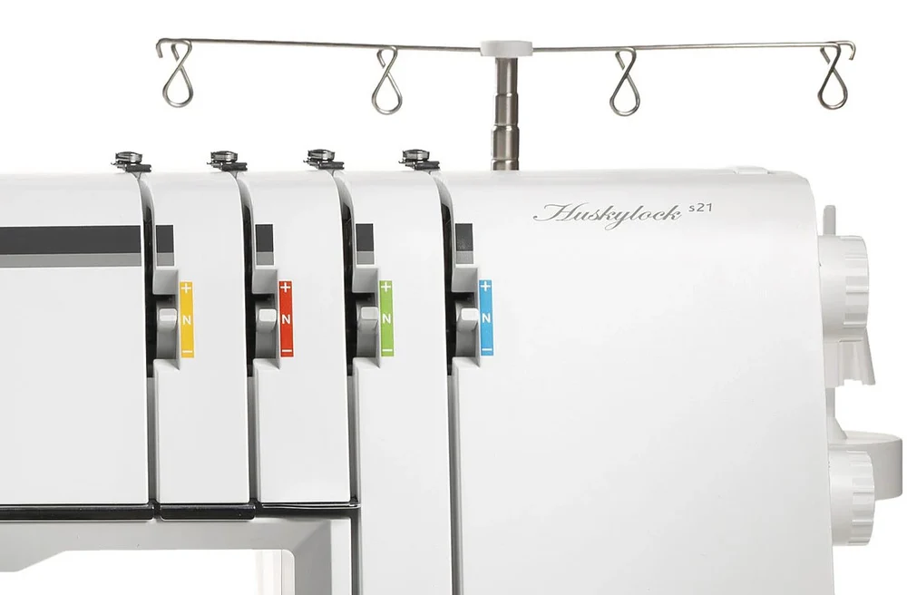 Thread tension dials on the Husqvarna Viking HUSKYLOCK S21 Overlocker