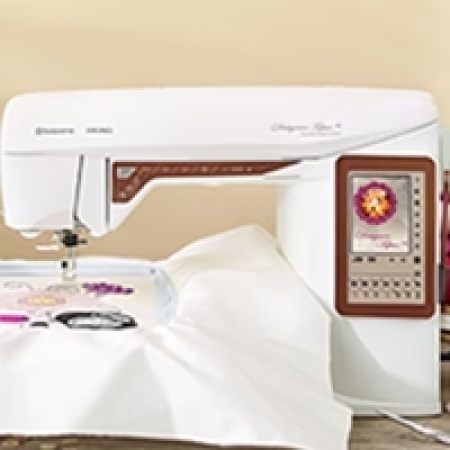 Husqvarna Designer Topaz 40 Sewing & Embroidery Machine with fabric and embroidery design