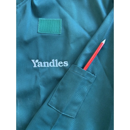 Yandles branded woodturning smock bottle green pencil pocket detail