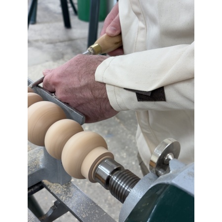 Natural woodturning smock Yandles branded cuff detail