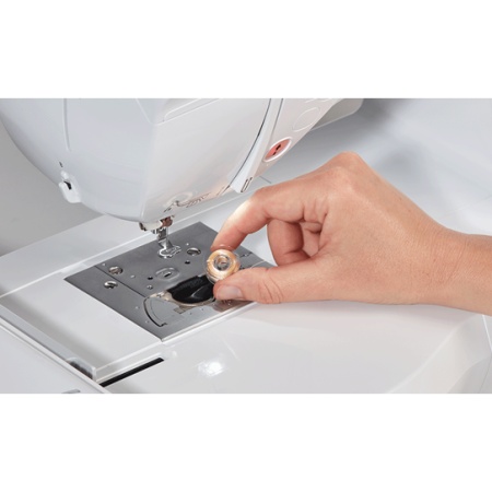 close up of the drop in bobbin feature on the Brother NV880E machine,