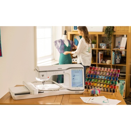 Sewing machine set up on the table in a sewing room, Brother Stellaire XE2
