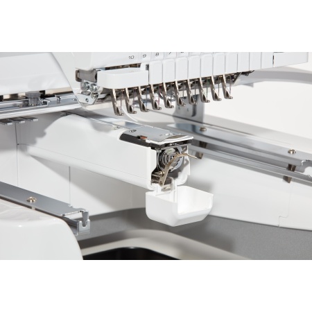 Close up of the embroidery machine with all 10 needles on show.