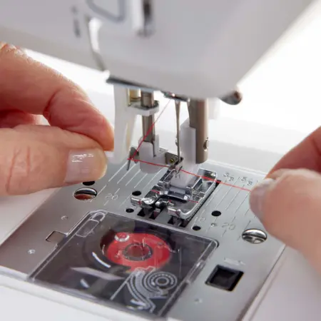 Top drop-in bobbin system of Husqvarna Viking Onyx 15 sewing machine